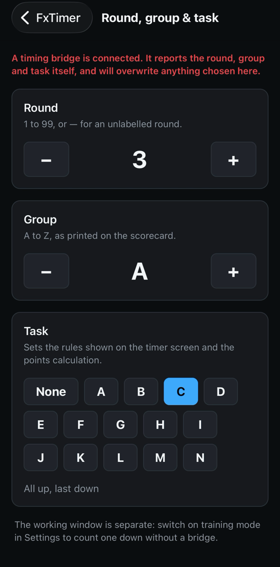 The round, group and task picker, with a warning that a connected timing bridge will overwrite the chosen values