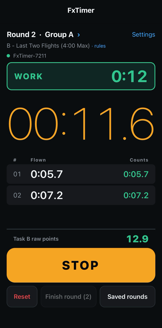 The timer screen during working time: round 2 group A, task B, a green WORK countdown at 12 seconds, the stopwatch running at 11.6 seconds, two recorded flights and the round's score
